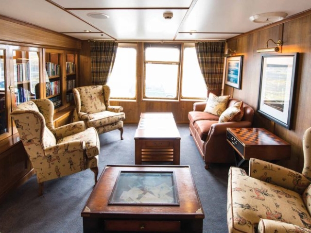 The library on board the Hebridean Princess cruise ship of Hebridean Island Cruises